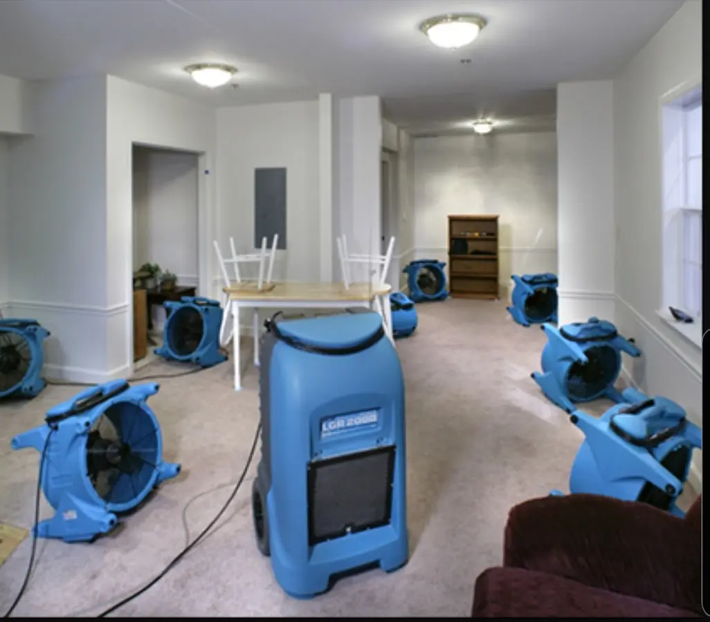 Air movers and dehumidifier setup for Water Extraction & Removal in Warwick